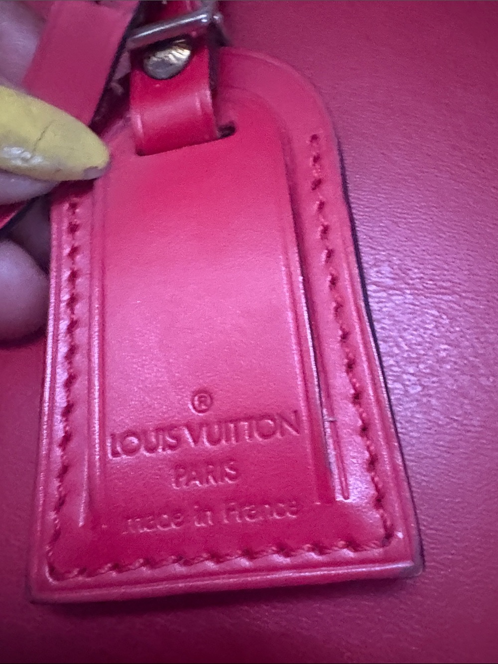 Louis Vuitton Bright Red TIAGA Leather Tag